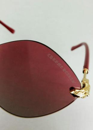 Chrome hearts очки унисекс солнцезащитные модные ромбовидные безоправные бордовые с золотом9 фото