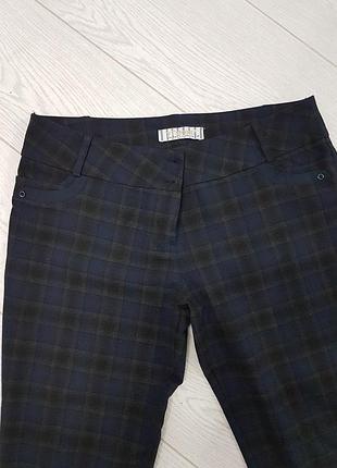Брюки в клетку.
