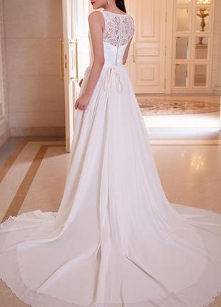 Свадебное платье а-силуэт закрытое кружевное пышное2 фото