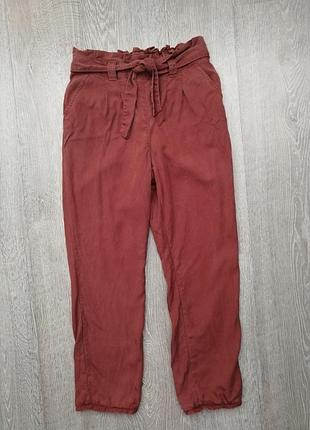 Актуальні штани теракотового кольору