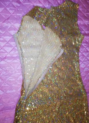 Золотисту сукню з паєтками - розмір 40-42!2 фото
