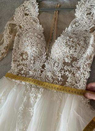 Дизайнерська весільна сукня10 фото