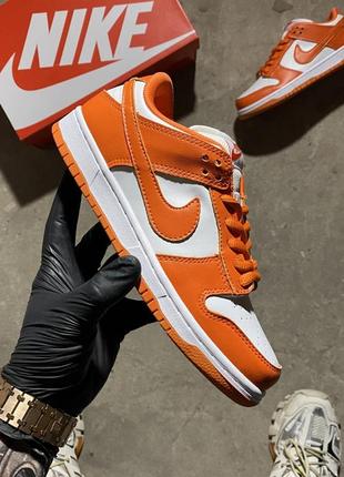 Женские кроссовки nike sb dunk low "ripe orange".1 фото