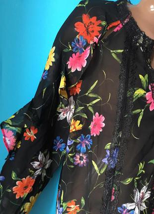 Нарядная блузочка с цветочным принтом и рюшами на рукавах 12uk4 фото