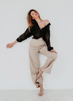 Бежеві широкі штани на високій посадці