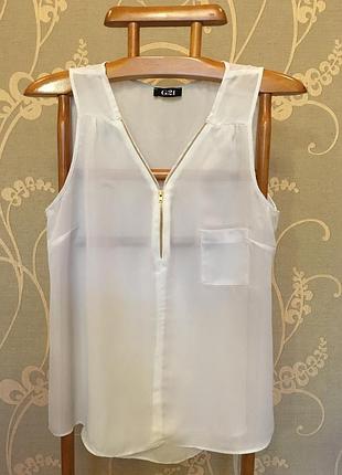 Дуже гарна і стильна брендовий блузка.