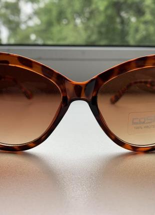 Стильные солнцезащитные очки в тигровой оправе1 фото
