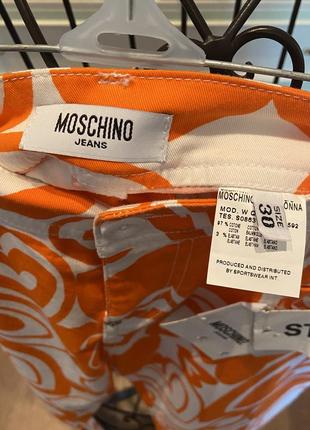 Джинсы moschino оригинал с принтом из оранжевых сердец3 фото