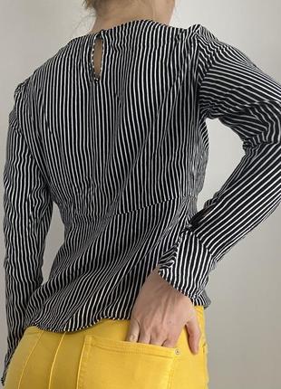 Блуза в полоску с баской2 фото