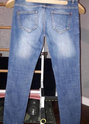 Рваные джинсы zara.2 фото