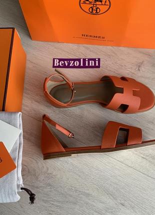 Оранжеві шкіряні босоніжки