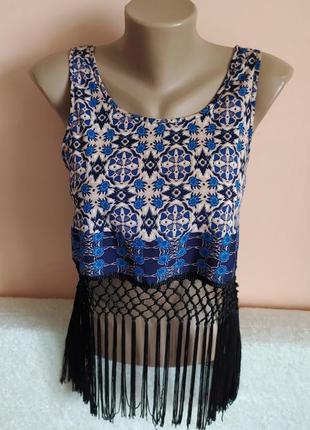 Модний топ в ідеалі,вказано р. 8.