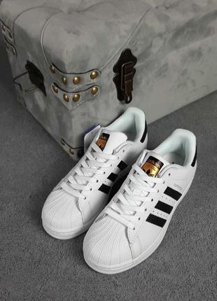 Шикарные женские кроссовки adidas superstar белые с чёрным9 фото