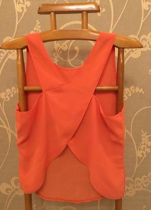 Очень красивая и стильная брендовая блузка оранжевого цвета 20.7 фото