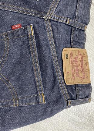 Женские короткие джинсовые шорты levis рваные4 фото