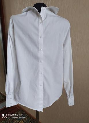 Белая рубашка с застёжкой на спине.4 фото