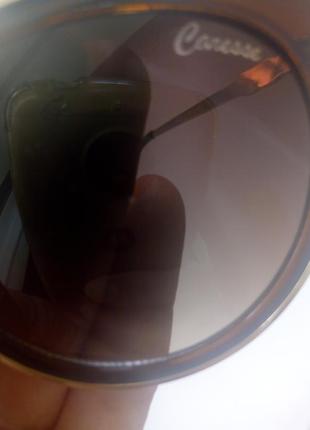 Очки фирменние caresse.