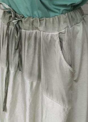 Итальянская коттоновая юбка с переходами ткани карманами с блестящим дизайном8 фото