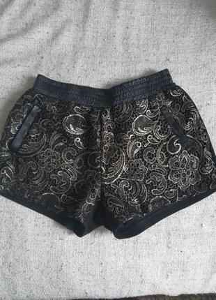 Шорти зі вставками шкіри та мережива