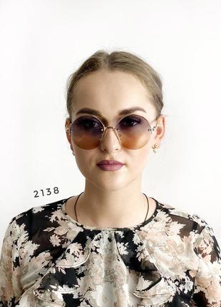 Сонцезахисні окуляри - лінза з переходом двох кольорів к. 21386 фото