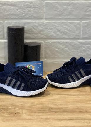 Текстильні кросівки