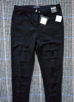Джинси рвані,чорні джинси,рванки2 фото
