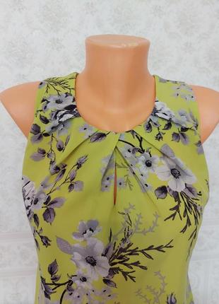 Яскрава блуза блузка топ в квіти з гудзиками на спині2 фото