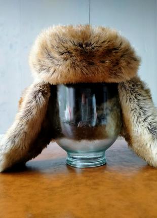 Меховая шапка на зиму от известного бренда.1 фото