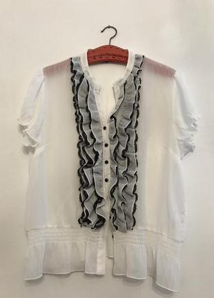 Блузка с воланом спереди1 фото