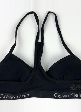 Комплект нижньої білизни calvin klein (топ + стрінги) колекція motive cotton lightly, розмір l7 фото