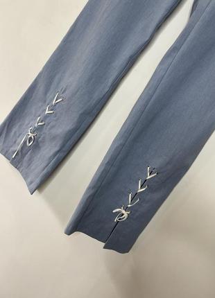 Стильные брюки с завязками клёш с в небесно -голубом оттенке5 фото