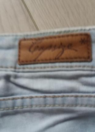 Джинси рвані