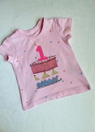 Гарненька фірмова футболочка на дівчинку.