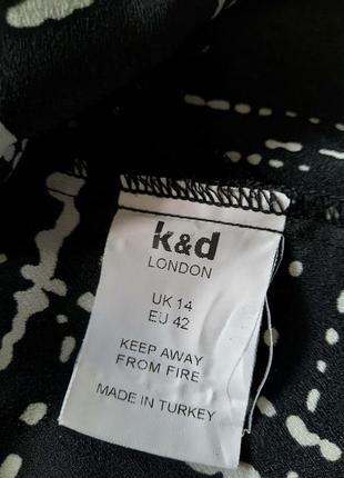 Женская черно-белая блуза, блузка, туника  почти в клетку бренда k&d .7 фото