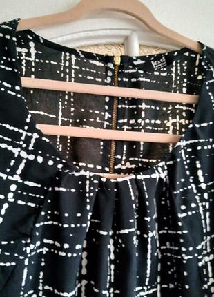 Женская черно-белая блуза, блузка, туника  почти в клетку бренда k&d .6 фото