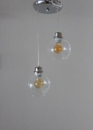 Люстра в стиле лофт с подвесными прозрачными плафонами