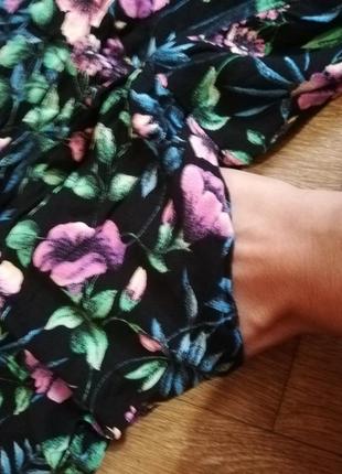 Комбінезон жіночий штанами брюками в квіточку відкрита спина з кишенями чорний6 фото