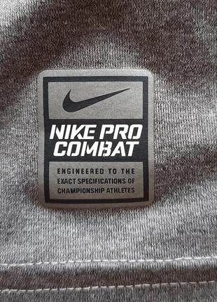 Сіра компресійна футболка nike pro combat dri fit4 фото