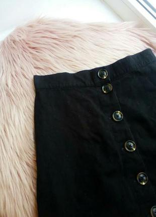 Джинсовая юбка трапеция на мраморных пуговицах