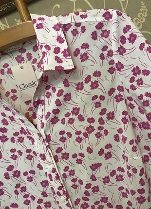 Очень красивая и стильная брендовая блузка в цветах.8 фото