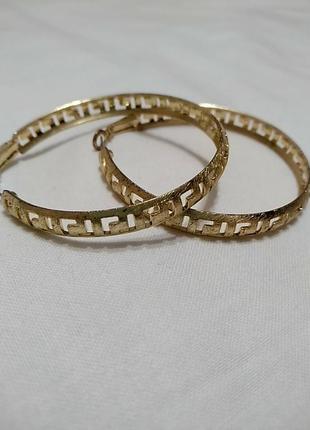 Серьги кольца в золотом цвете. 4