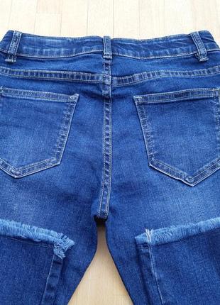 Укорочені джинси кльош з бахромою двоколірні джинси4 фото
