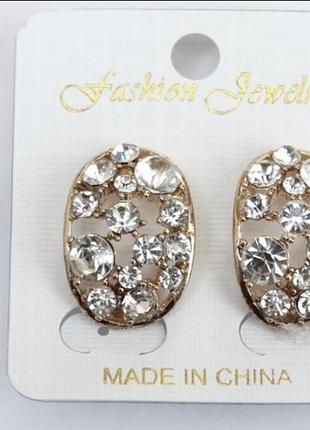 Кліпси з білими стразами