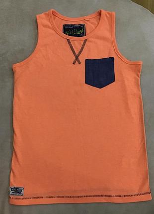 Майка яскрава помаранчева next 8-9