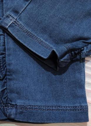 Сині джинси з оборками для дівчинки idexe р. 983 фото