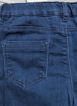 Сині джинси з оборками для дівчинки idexe р. 985 фото