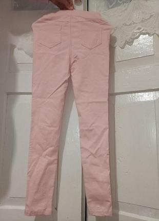 Розовые штаны скини с разрезом на коленках2 фото