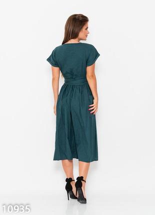 Темно-зеленое коттоновое платье на запах с карманами2 фото