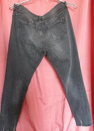 Серые джинсы с дырками5 фото