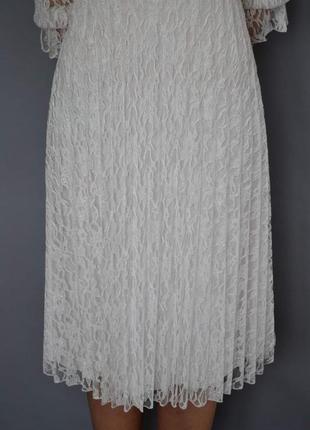 Белое кружевное платье с рукавами три четверти.6 фото